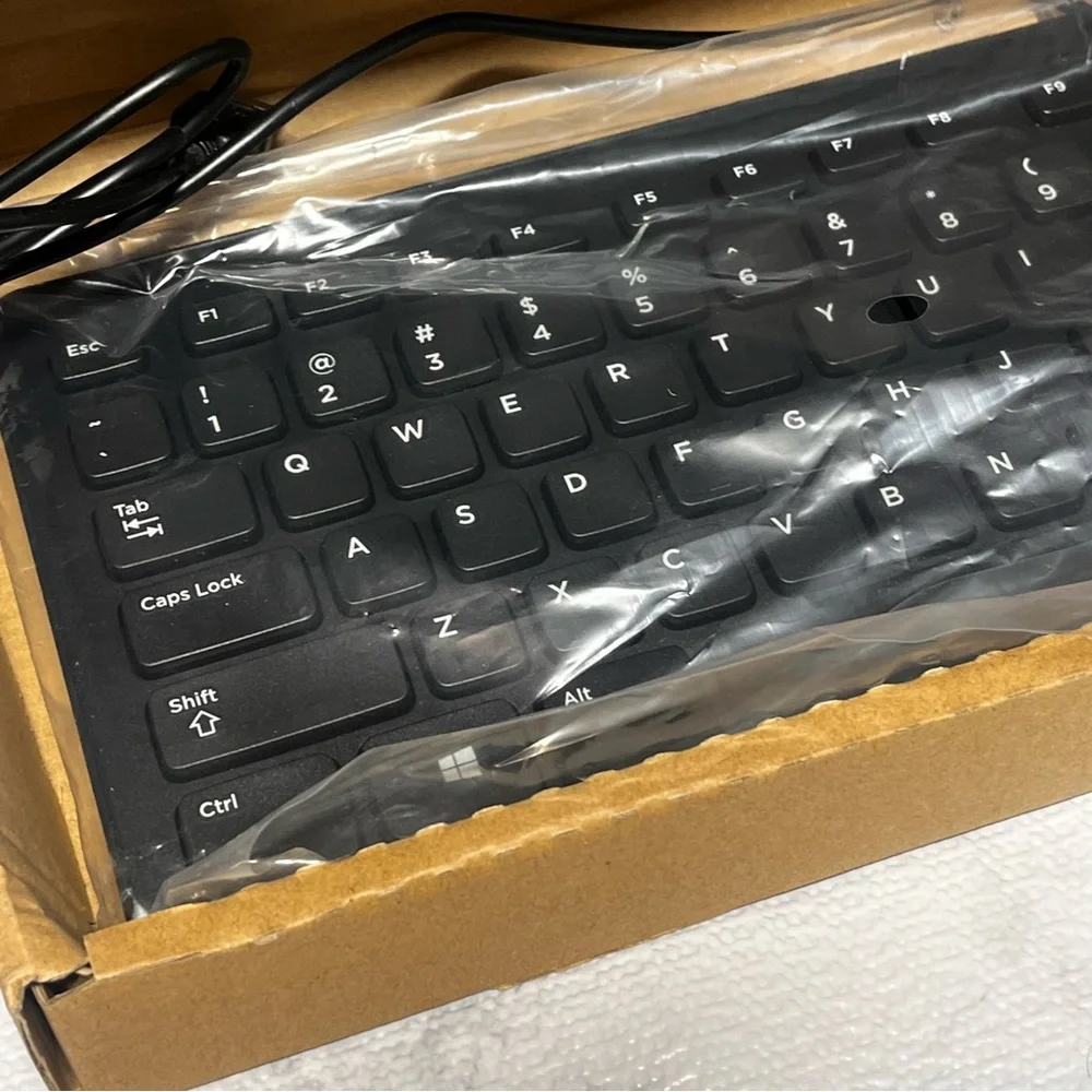 Dell wired keyboard KB113p. New in Box